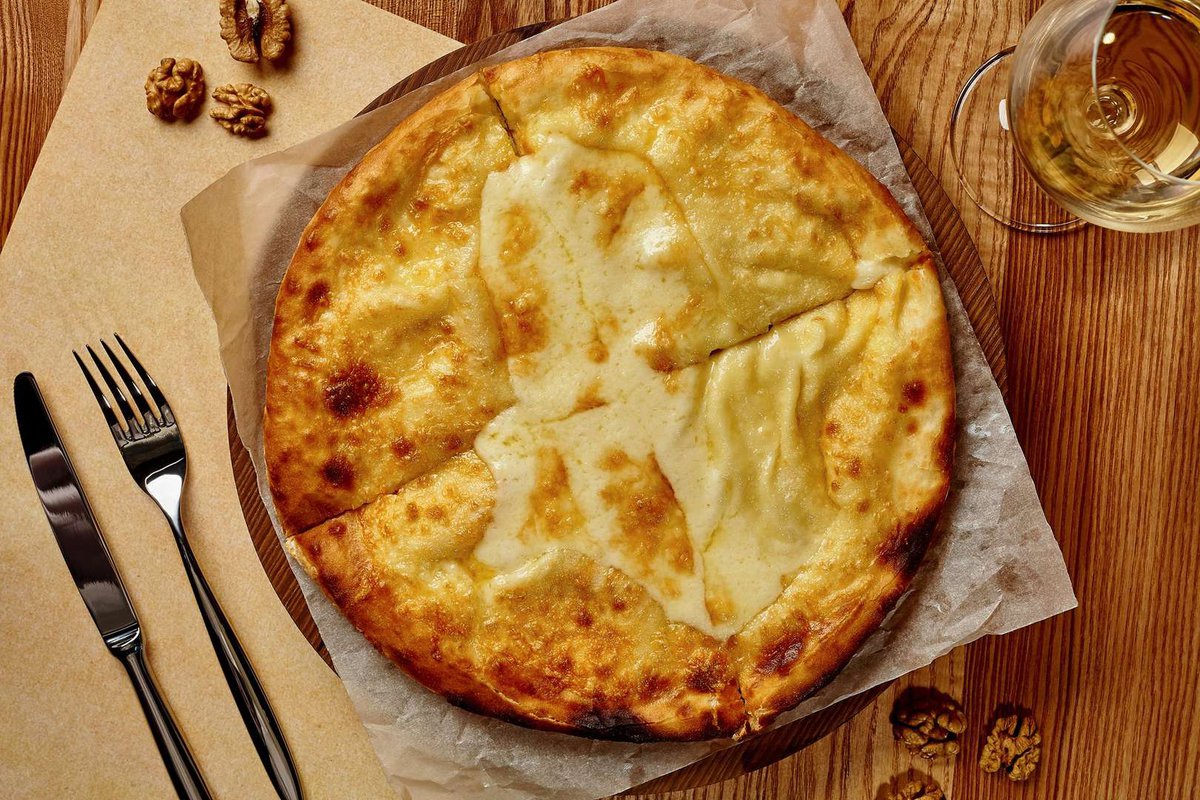 The traditional Georgian dish is khachapuri