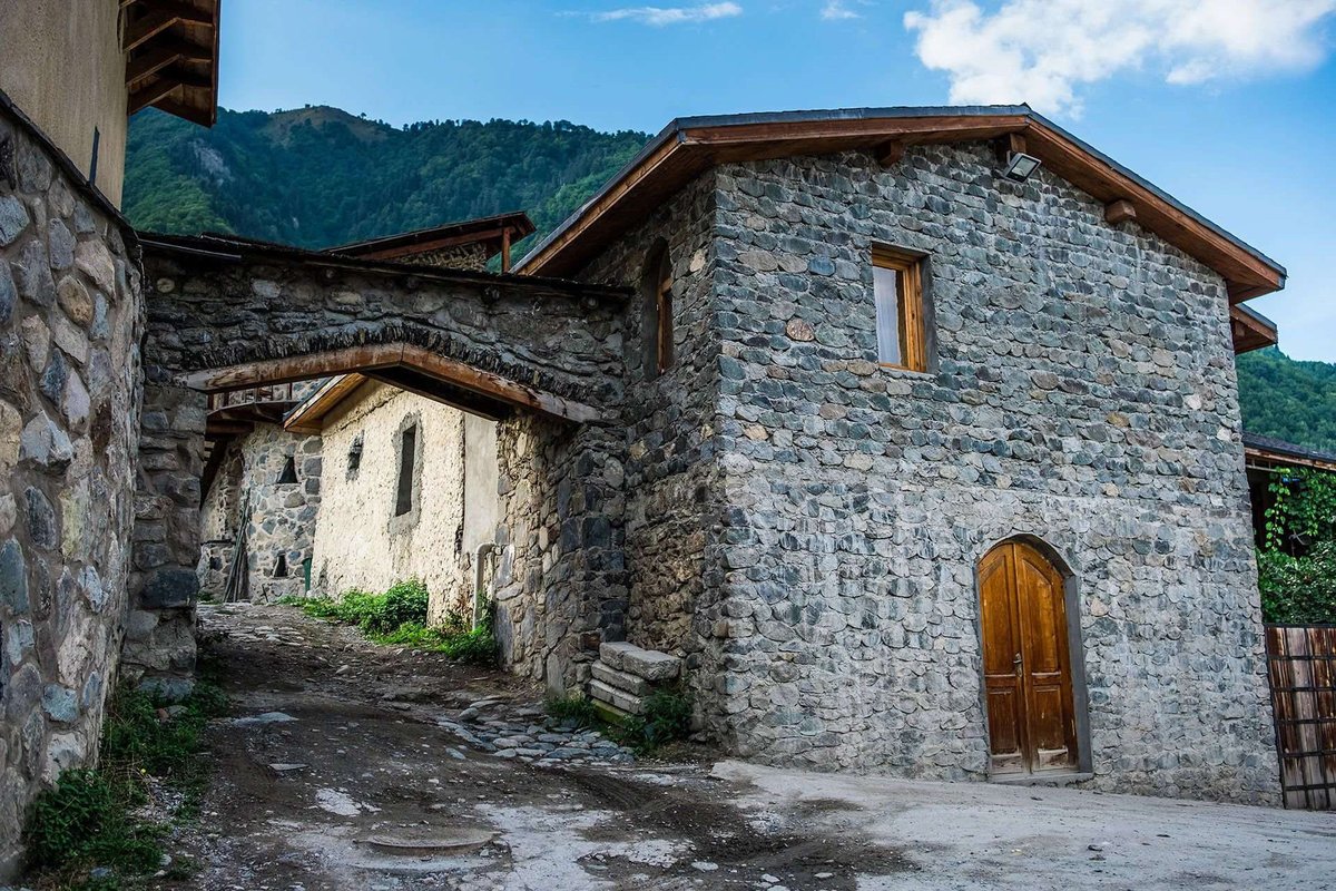 typical-old-stone-house-with-wooden-door-mestia.original