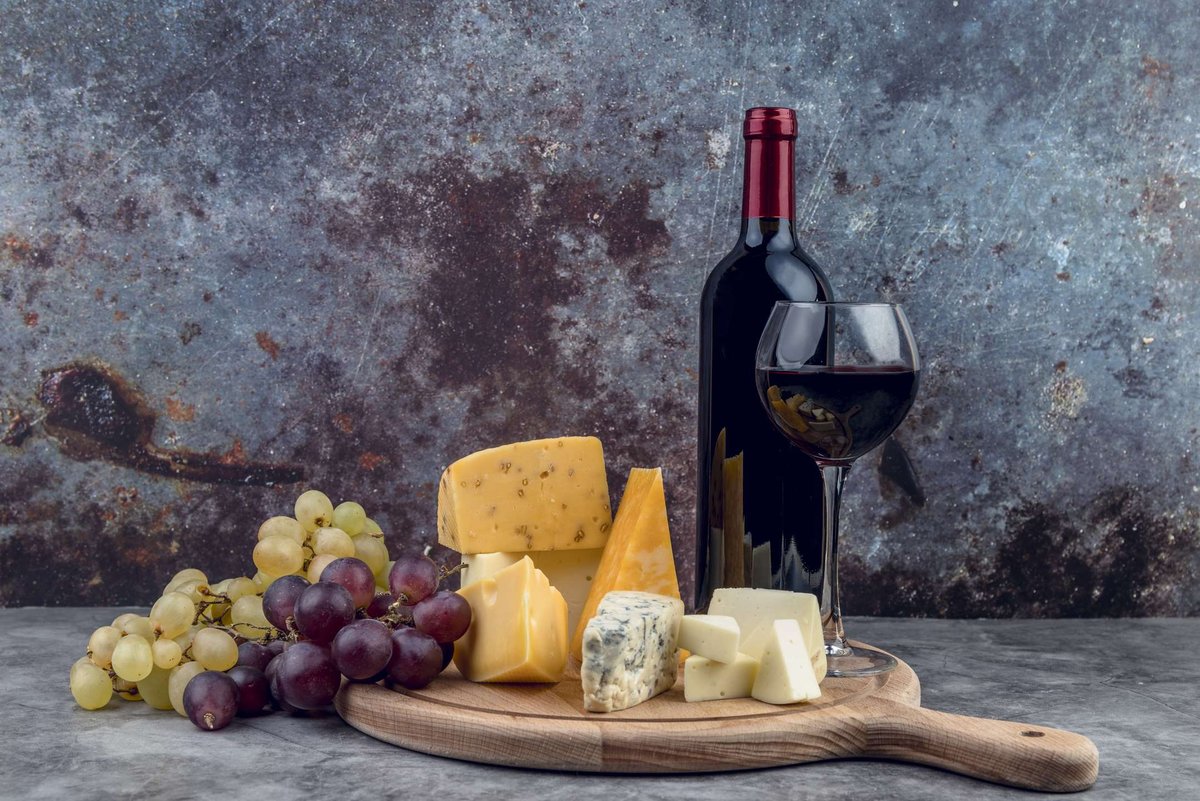 variety-of-tasty-cheese-and-grapes-with-wine