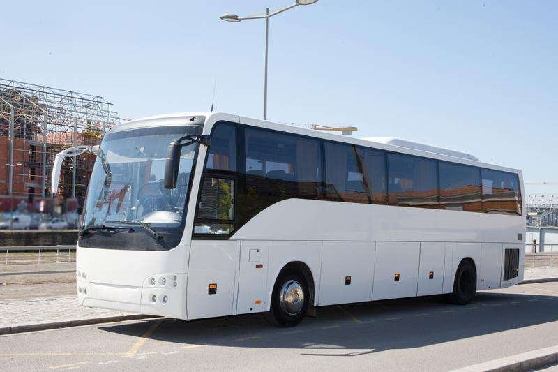White bus on the road