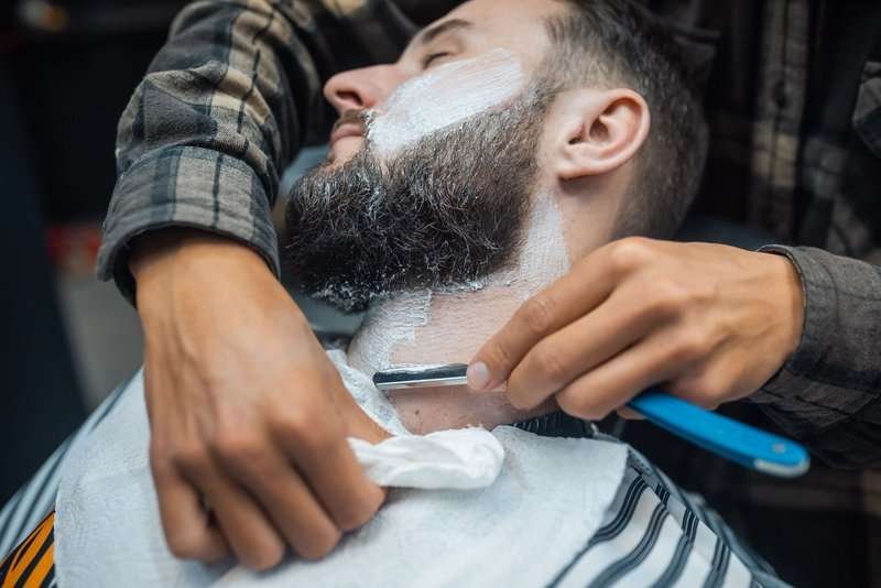 Shaving at the barbershop